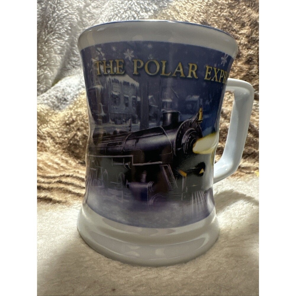 The Polar Express Embossed Train Going Through Town Hot Chocolate Mug / Cup.